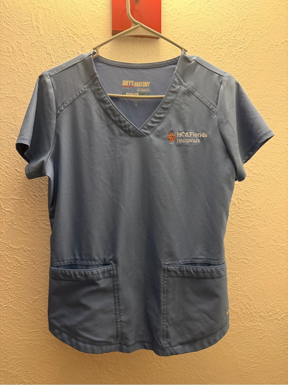 Grey's Anatomy Light Blue V-Neck Scrub Top with HCA Florida Healthcare Logo